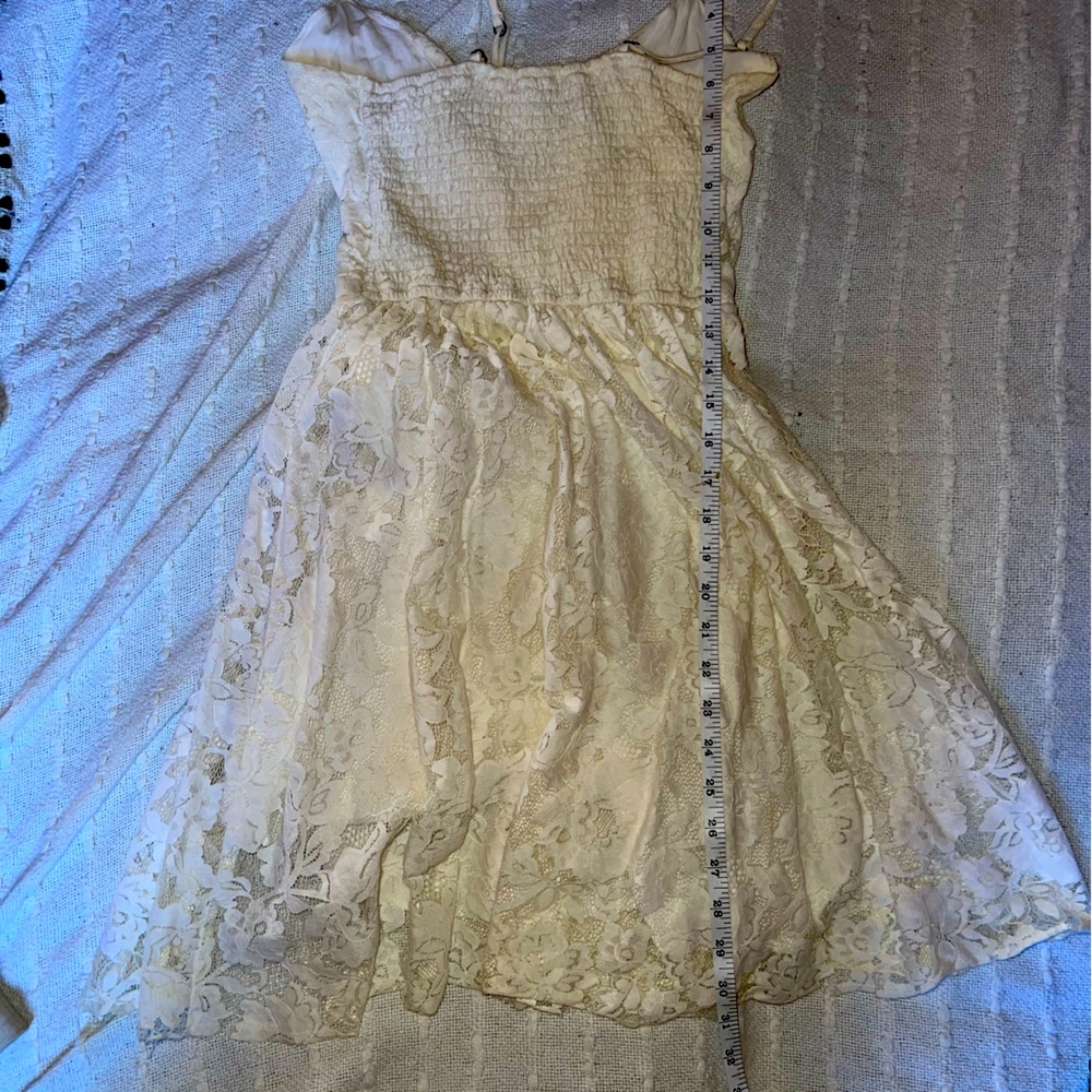 A & F white, fully lined lace dress with spaghetti straps.